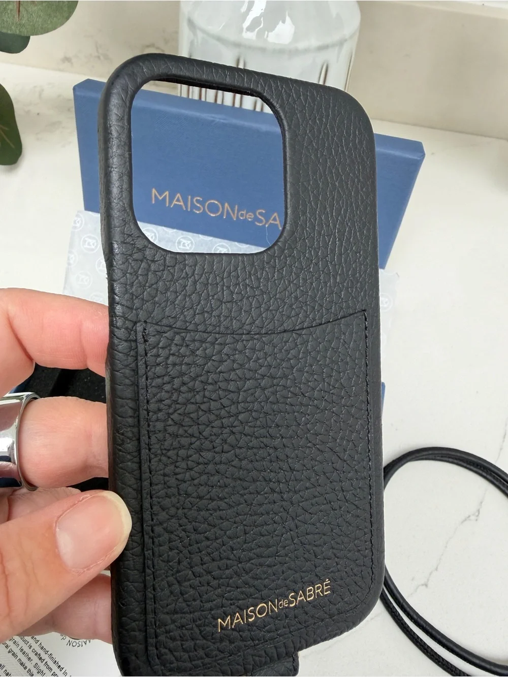 Maison de Sabre Sling Phone Case iPhone 14 Pro in Black Caviar and Gold Hardware